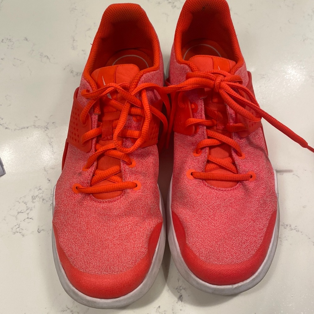 Orange Nike shoes